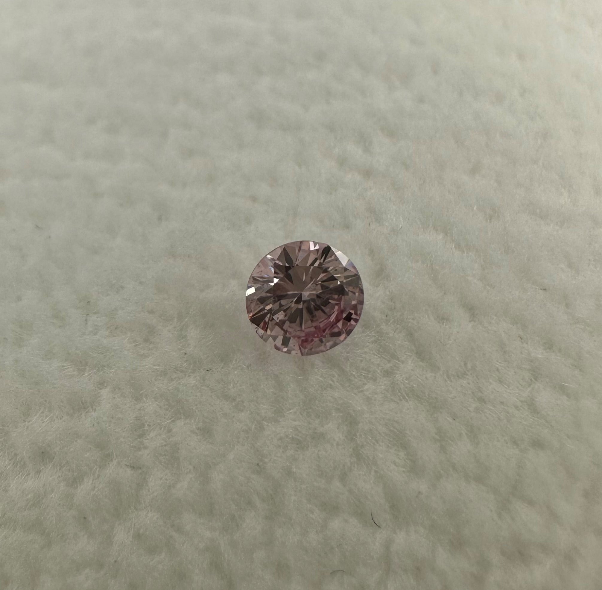 0.103ct round brilliant cut 7PP Argyle Pink Diamond