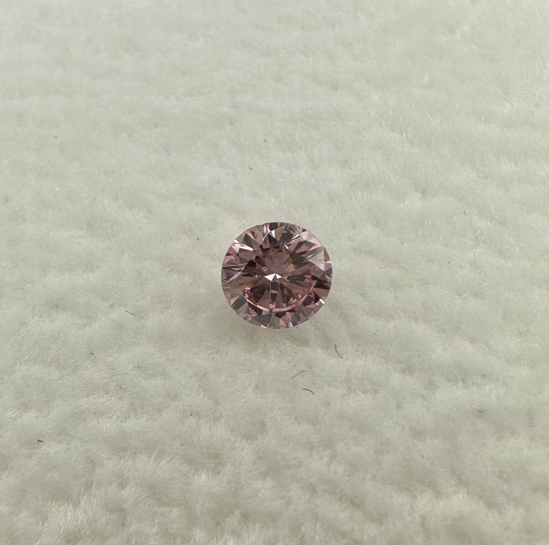 0.122ct round brilliant cut 6P Argyle Pink Diamond