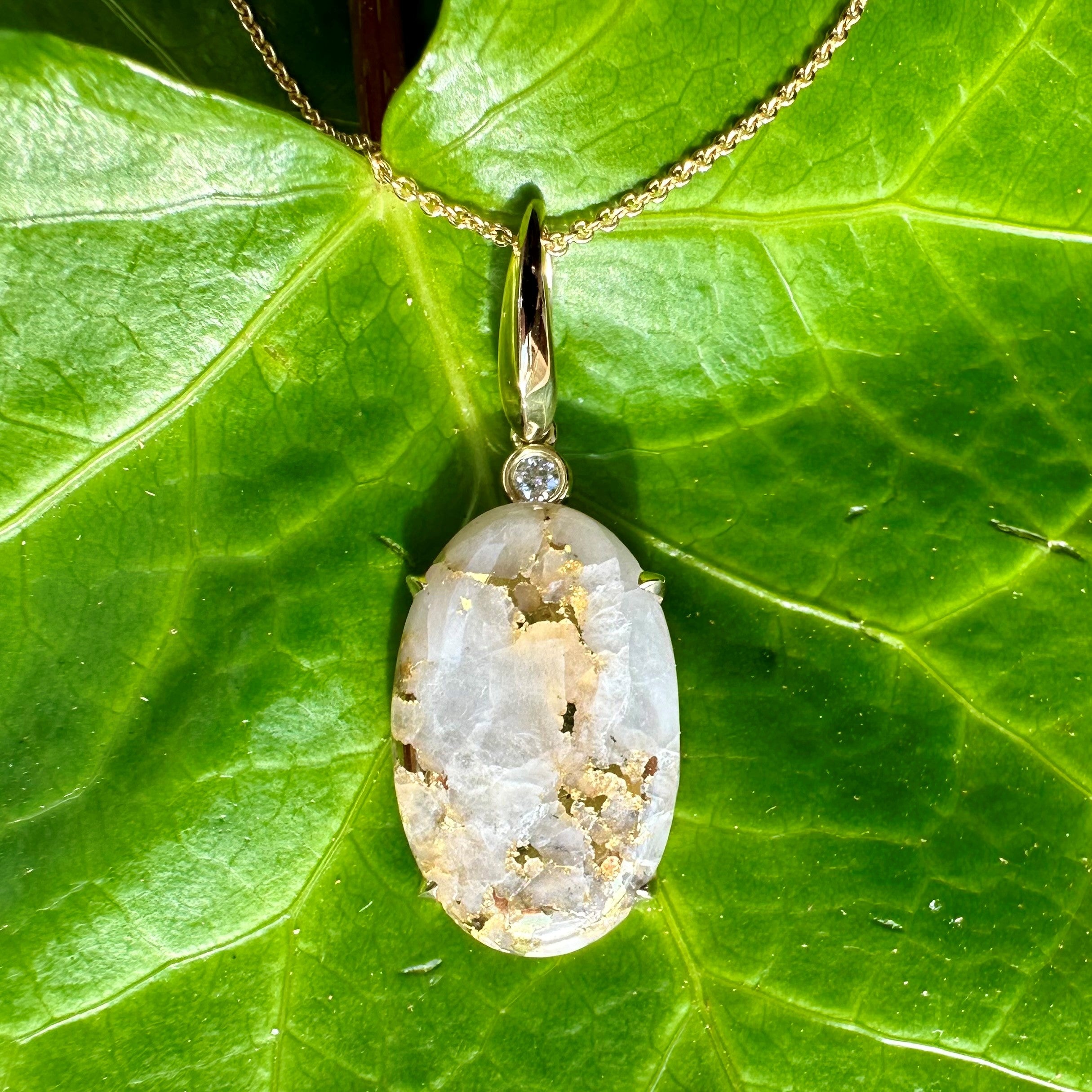 Oval Gold Quartz Diamond Pendant