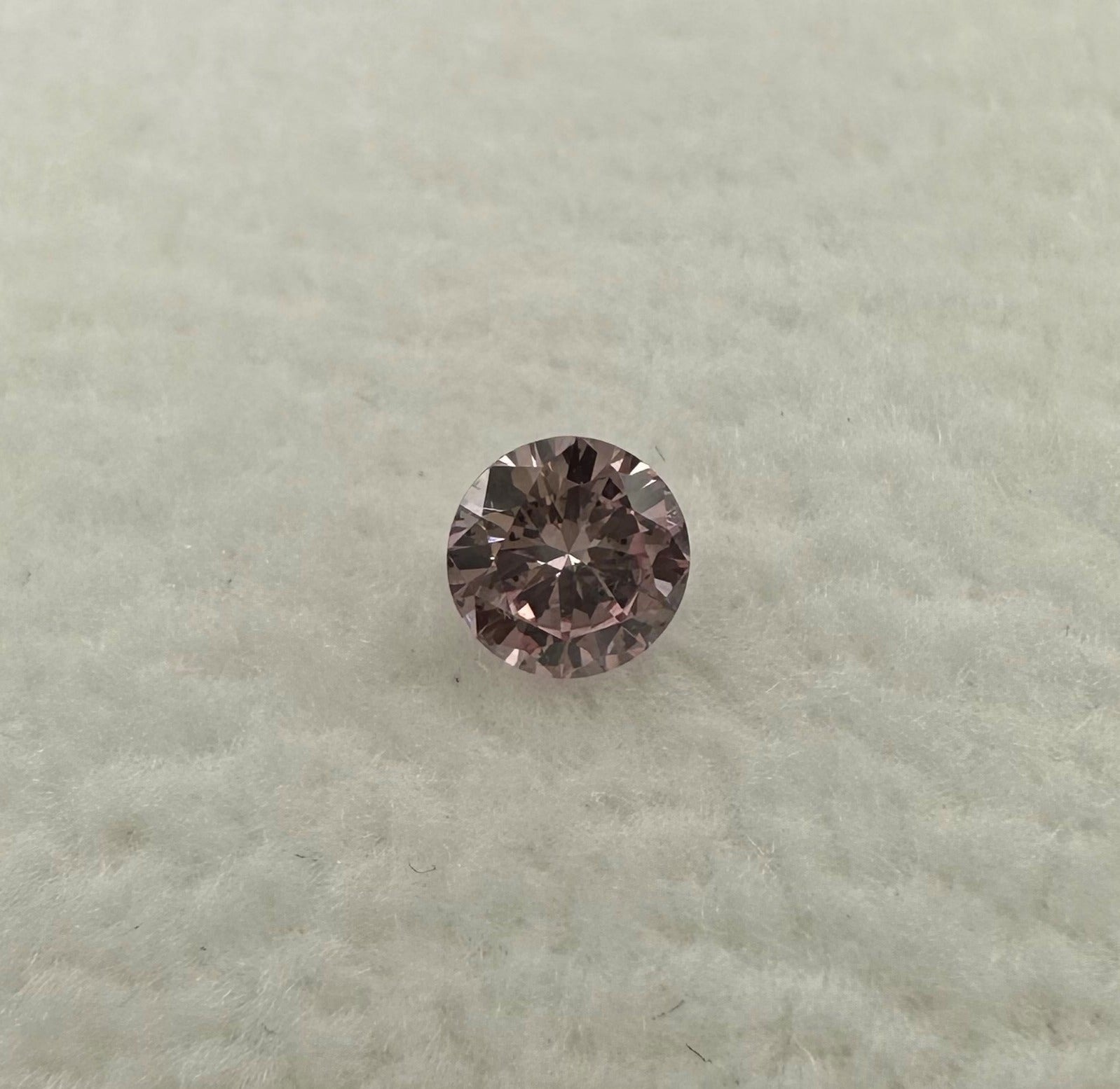 0.128ct round brilliant cut 7P Argyle Pink Diamond